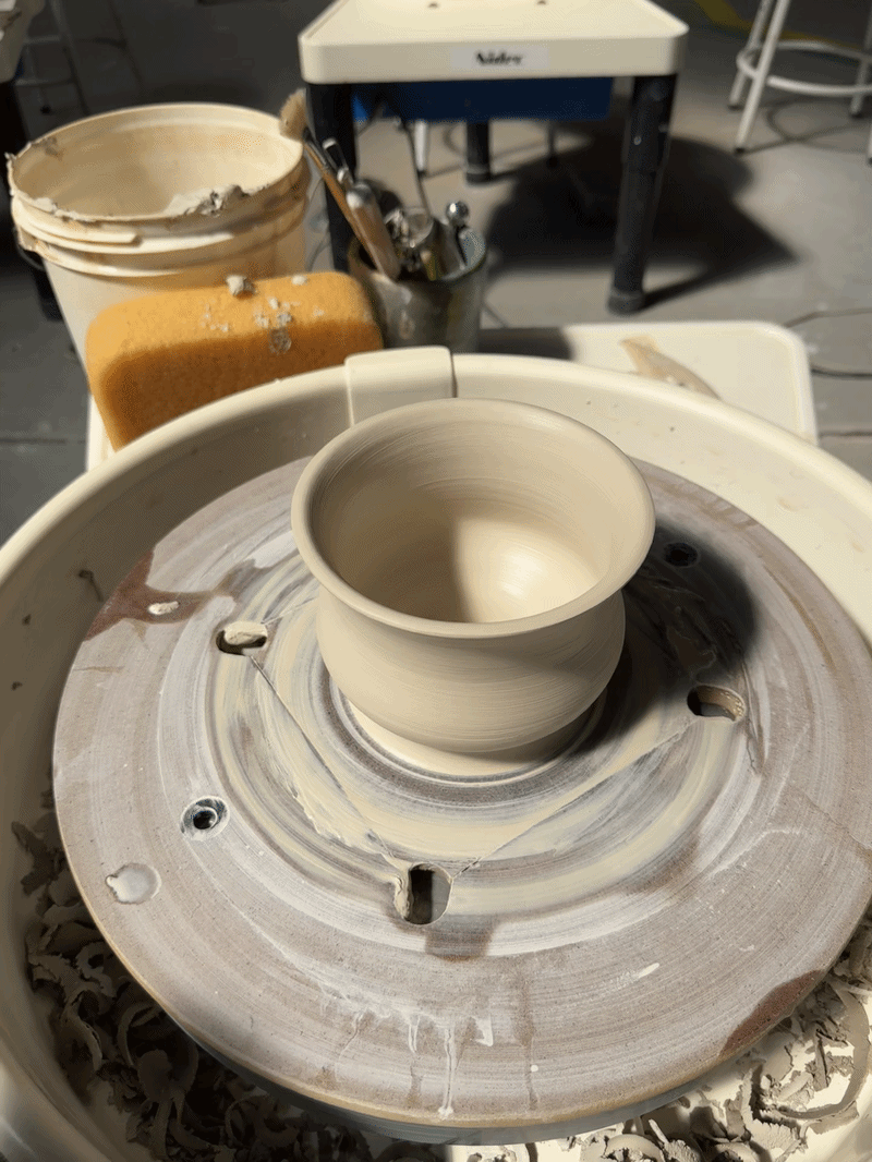 Pottery spinning on a wheel